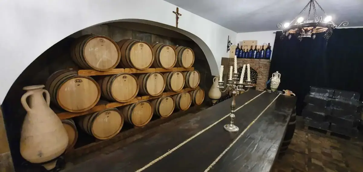Barrels along the vaulted cellar at Drace